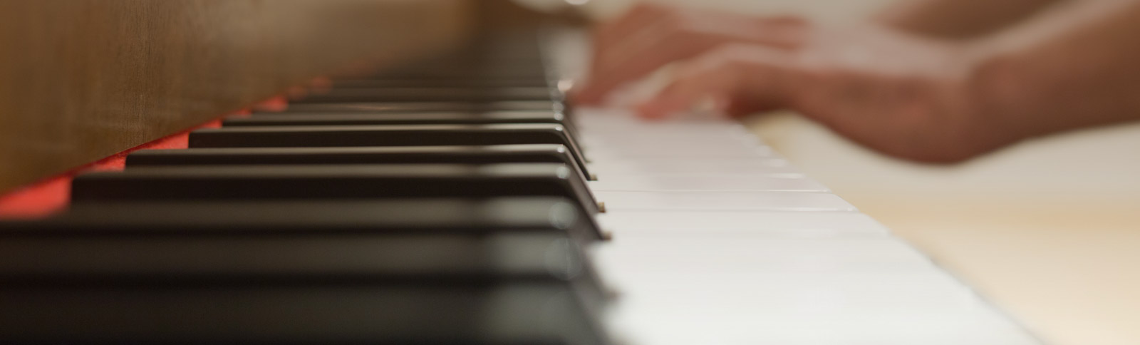 Banner photo showing a piano
